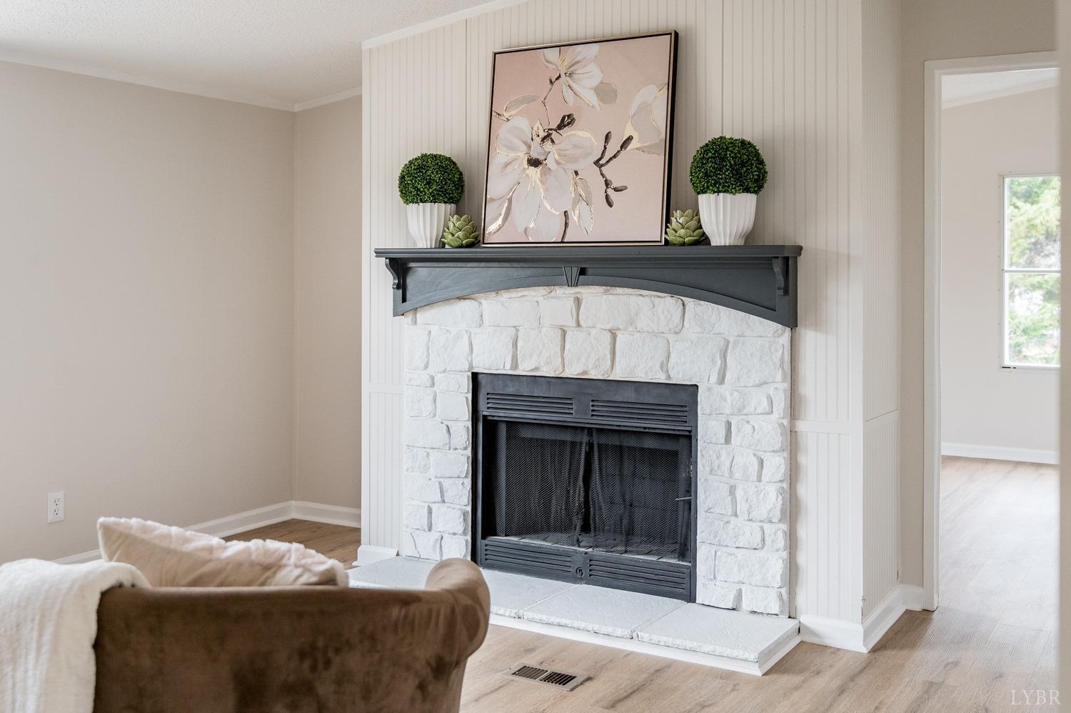 1636 Maddox Road Gladys, VA 24554 - Photo 36 of 54 a living room with furniture and a fireplace