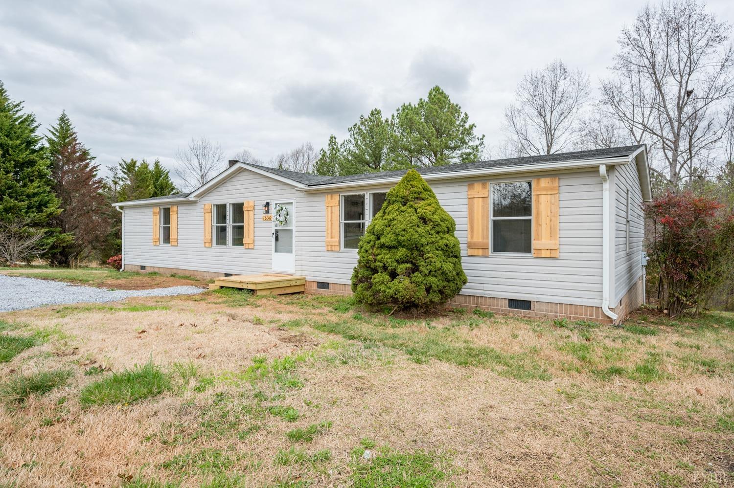 1636 Maddox Road Gladys, VA 24554 - Photo 43 of 54 a view of a house with a yard
