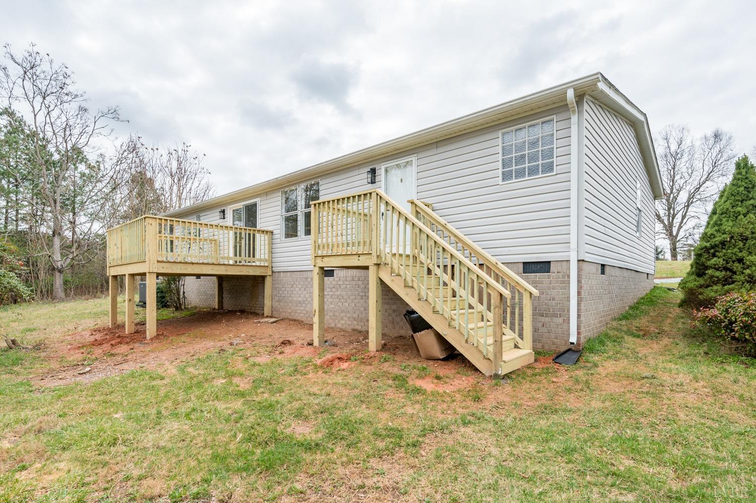 1636 Maddox Road Gladys, VA 24554 - Photo 45 of 54 a view of a house with wooden fence