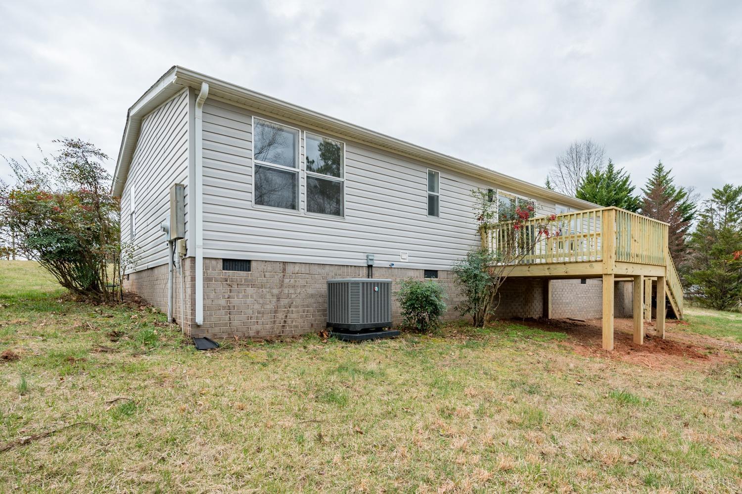 1636 Maddox Road Gladys, VA 24554 - Photo 47 of 54 a front view of a house with a yard