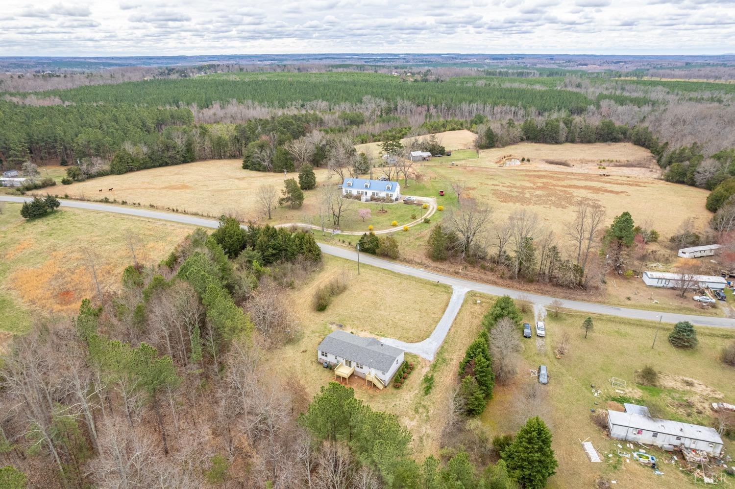 1636 Maddox Road Gladys, VA 24554 - Photo 53 of 54 a view of a swimming pool with a yard