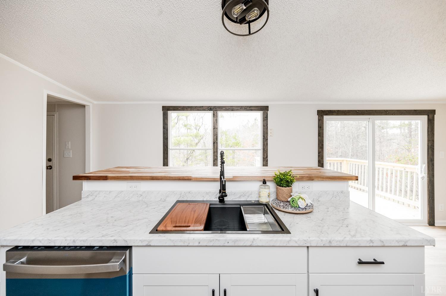 1636 Maddox Road Gladys, VA 24554 - Photo 9 of 54 a kitchen with a sink and a window
