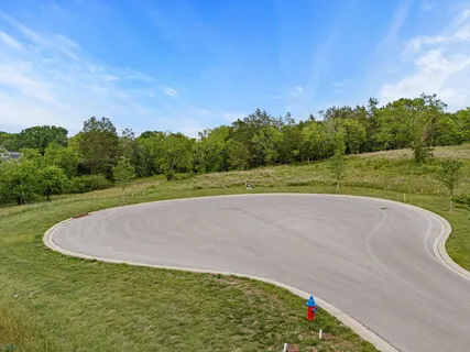 a view of a golf course with a garden