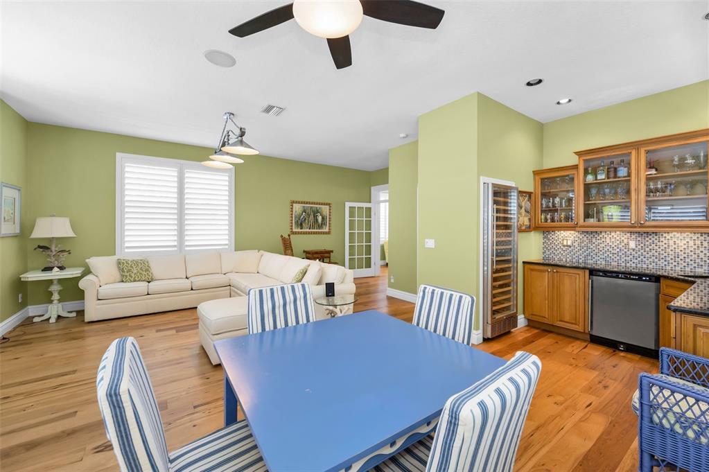 13303 Gulf Lane Madeira Beach, FL 33708 - Photo 12 of 42 a view of a dining room with furniture