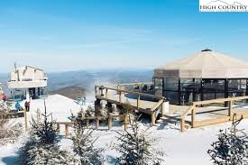 119 Shagbark Road Beech Mountain, NC 28604 - Photo 15 of 15 a view of a terrace with chairs