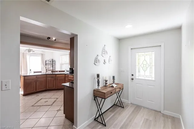 a room with a bed and a window