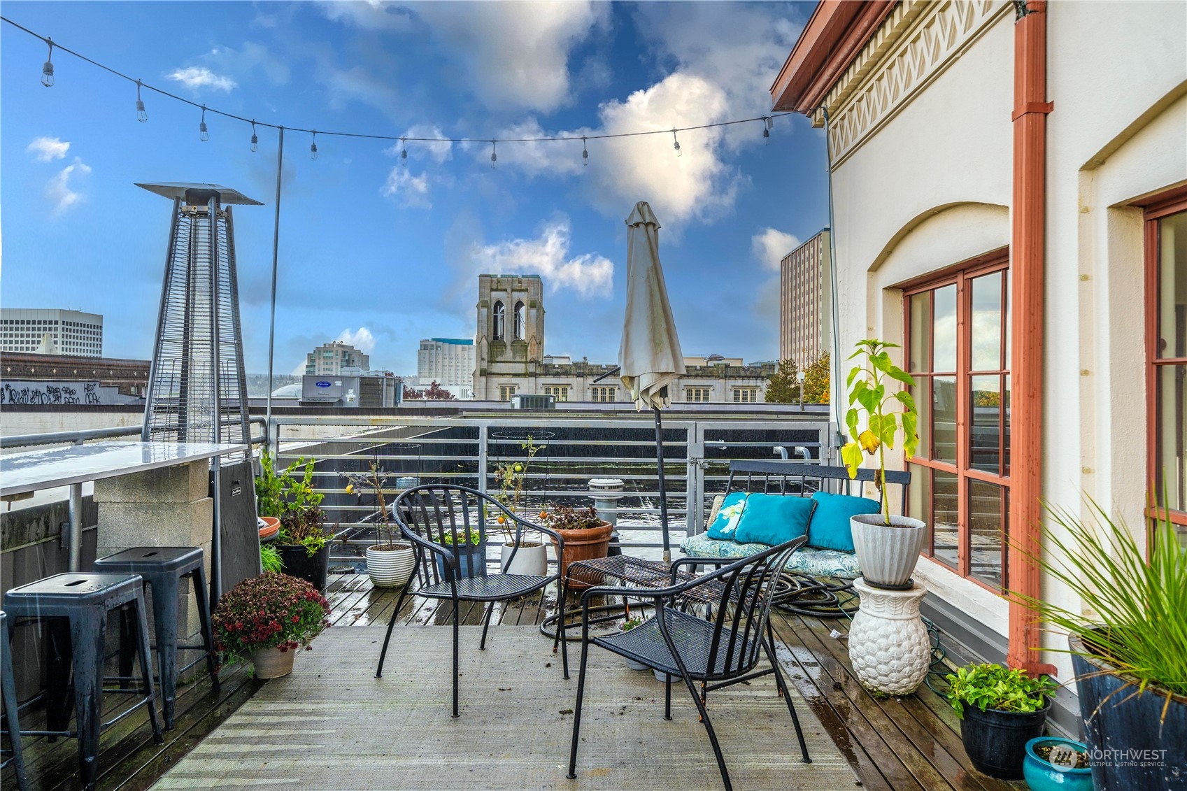 744 Market Street, Unit 302 Tacoma, WA 98402 - Photo 20 of 28 a view of a chairs and table in the terrace