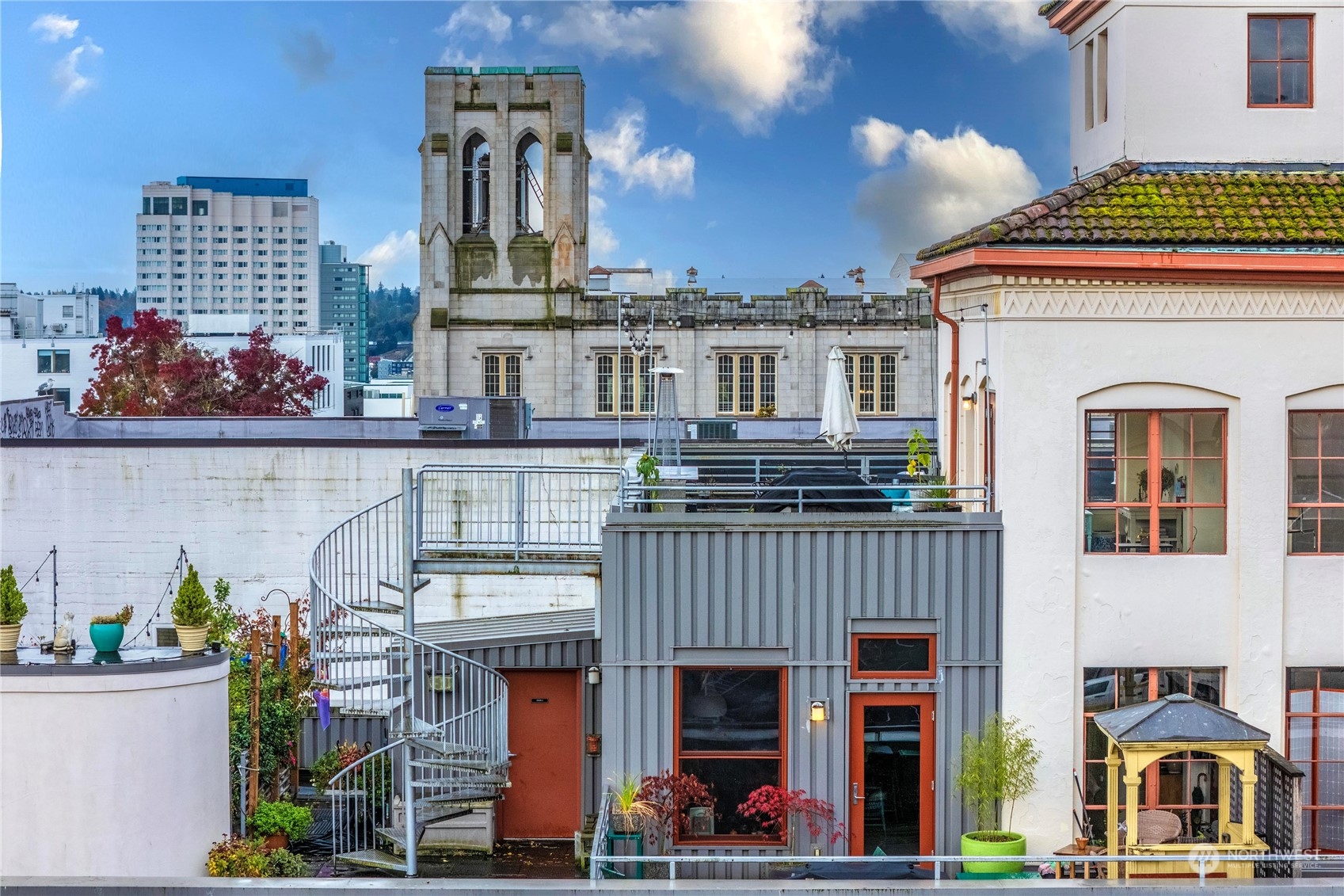 744 Market Street, Unit 302 Tacoma, WA 98402 - Photo 21 of 28 a front view of a building with glass windows
