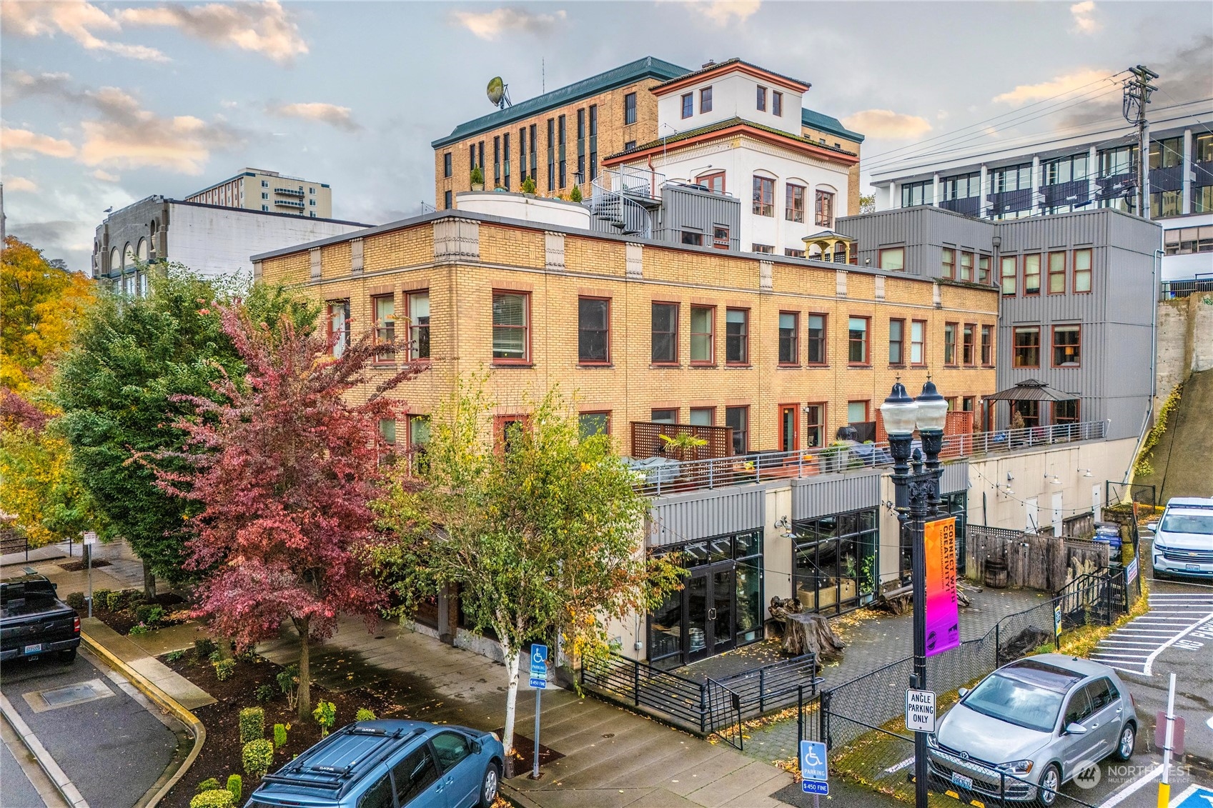 744 Market Street, Unit 302 Tacoma, WA 98402 - Photo 25 of 28 a front view of a building with many windows