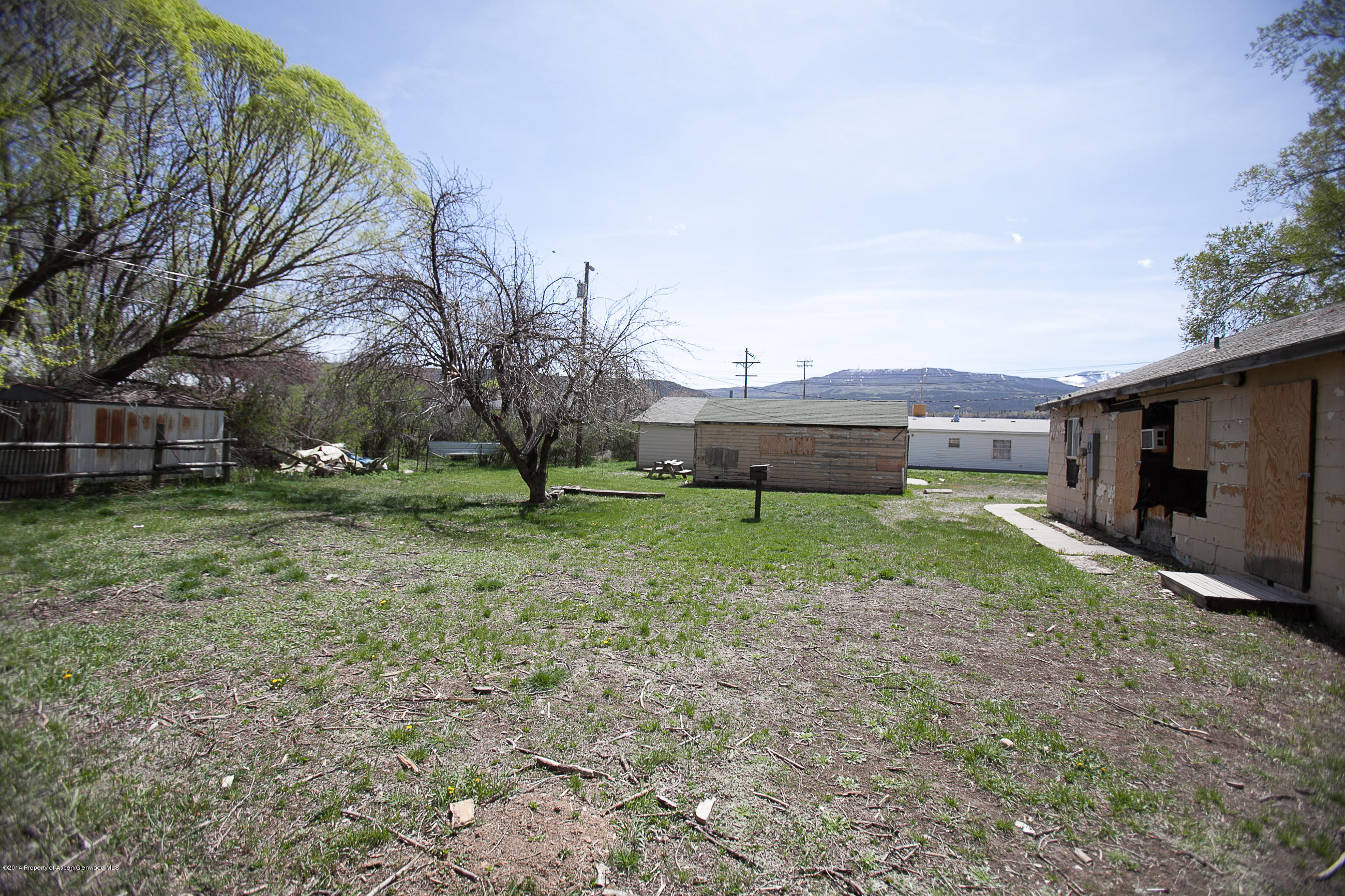 132 Ray Avenue Rifle, CO 81650 - Photo 9 of 10 a view of a house with a backyard