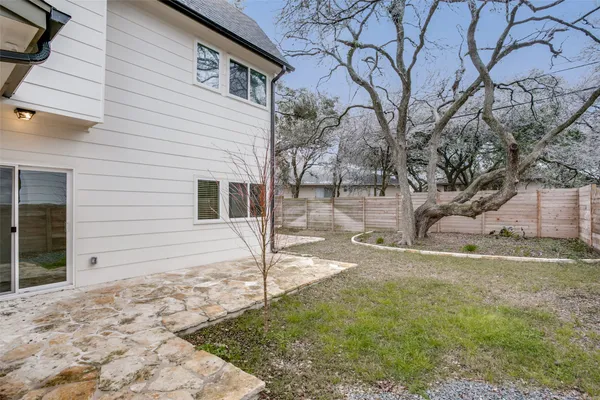 a backyard of a house with lots of green space
