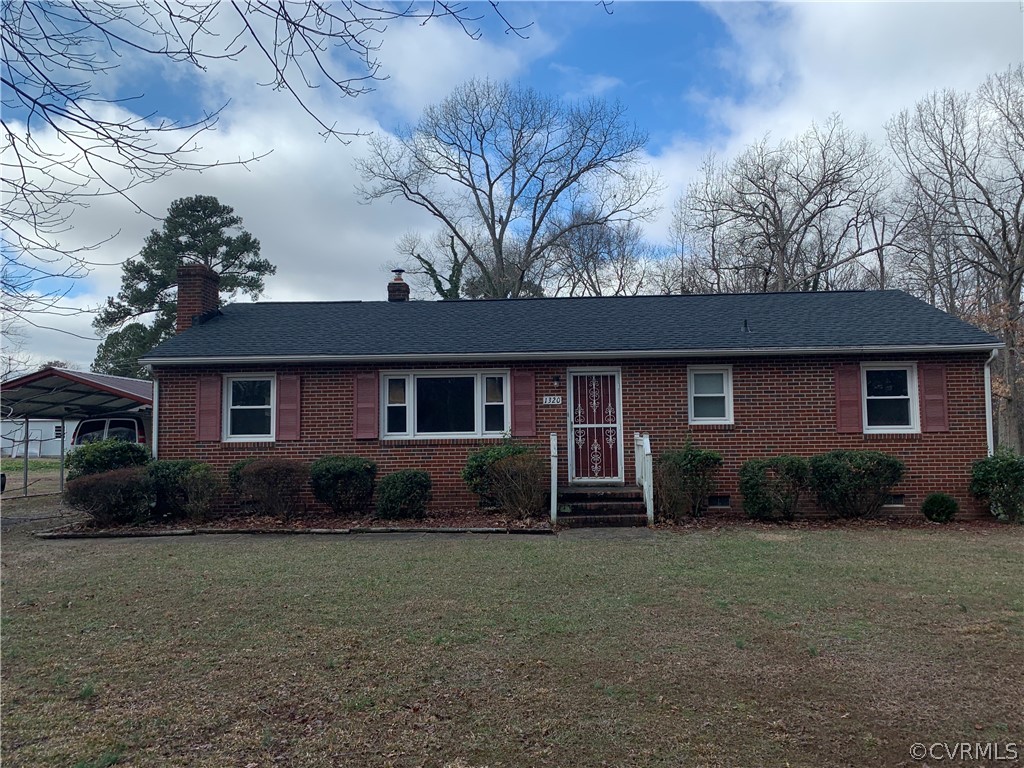 1320 Tower Light Road Midlothian, VA 23113 - Photo 2 of 5 a front view of a house with garden