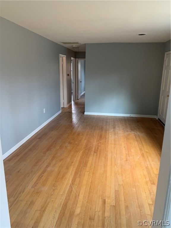 1320 Tower Light Road Midlothian, VA 23113 - Photo 3 of 5 a view of an empty room with wooden floor