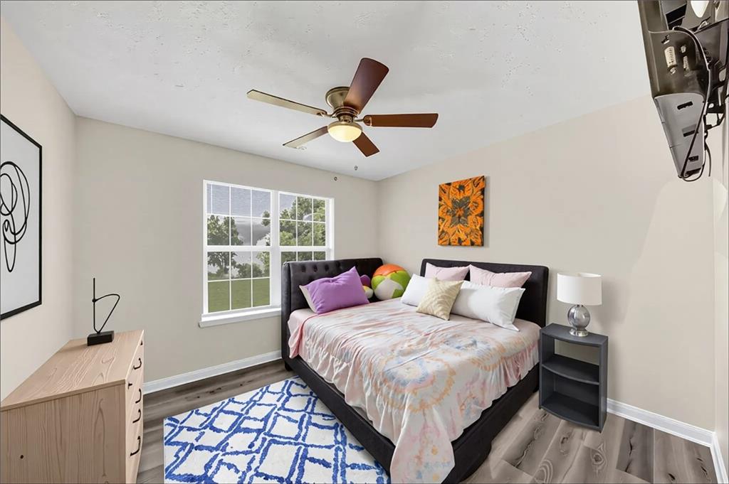 2880 Field Spring Drive Lithonia, GA 30058 - Photo 31 of 31 a bedroom with a bed and a window