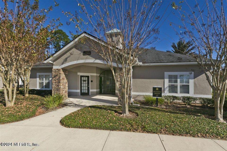 160 Legendary Drive, Unit 206 St. Augustine, FL 32092 - Photo 17 of 20 a front view of a house with garden