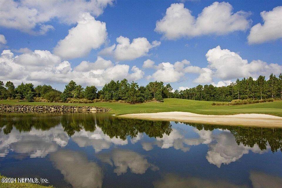 160 Legendary Drive, Unit 206 St. Augustine, FL 32092 - Photo 20 of 20 a view of a lake with a city view