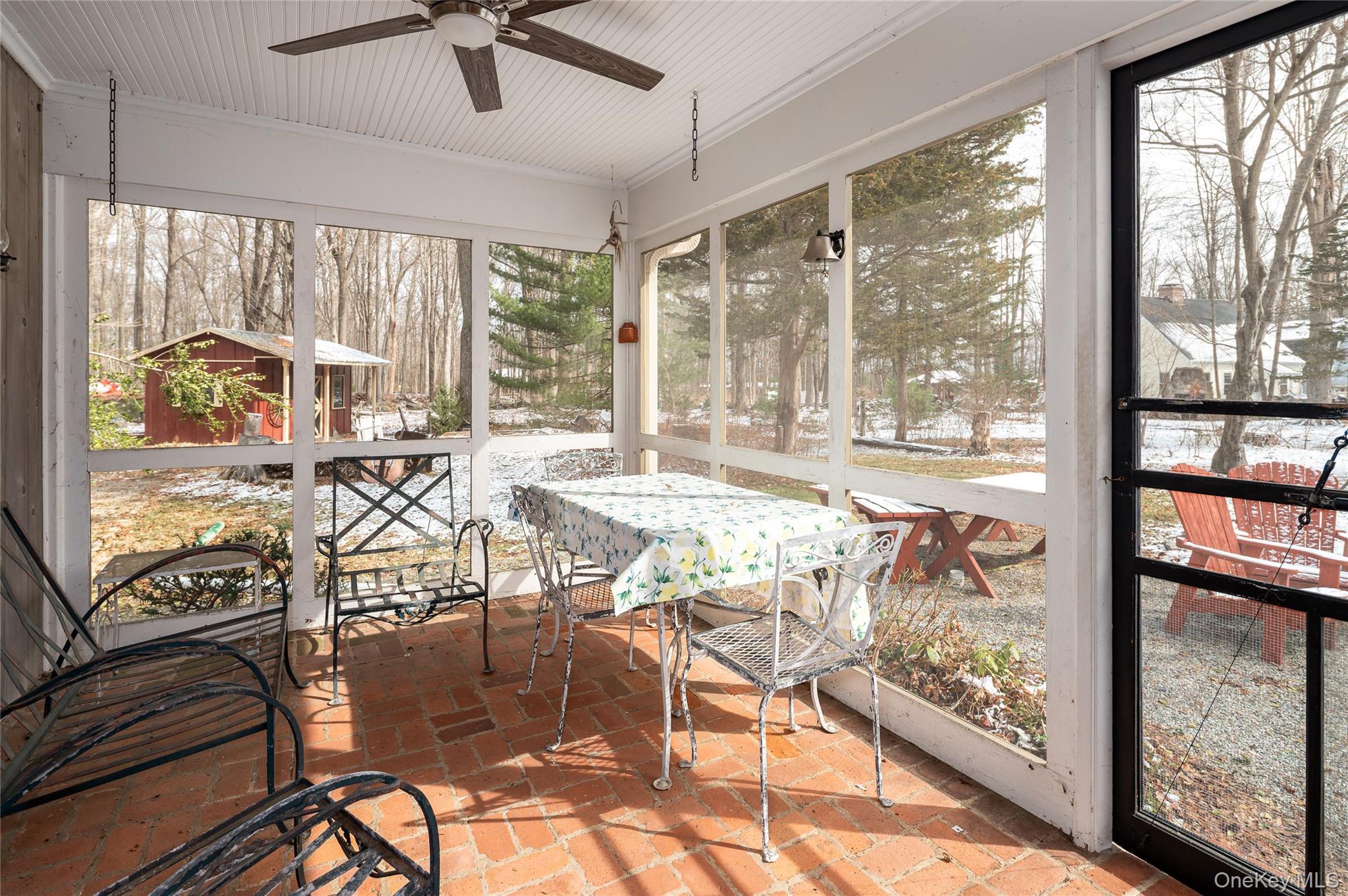 50 W Road South Salem, NY 10590 - Photo 11 of 29 a living room with furniture and a floor to ceiling window