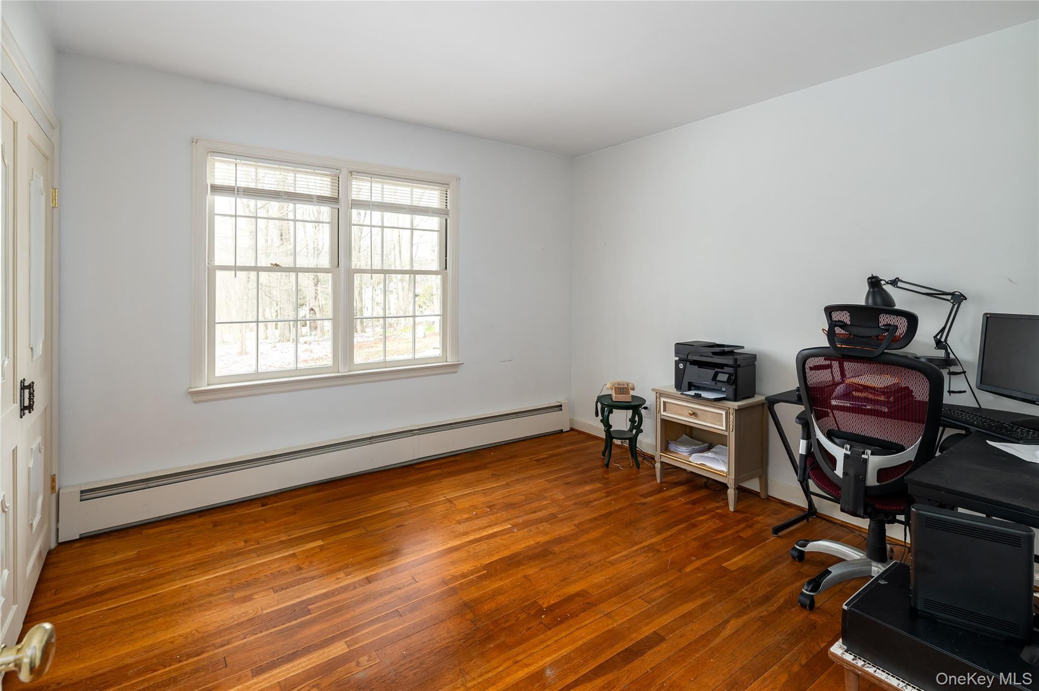 50 W Road South Salem, NY 10590 - Photo 14 of 29 a view of a workspace with furniture and a window