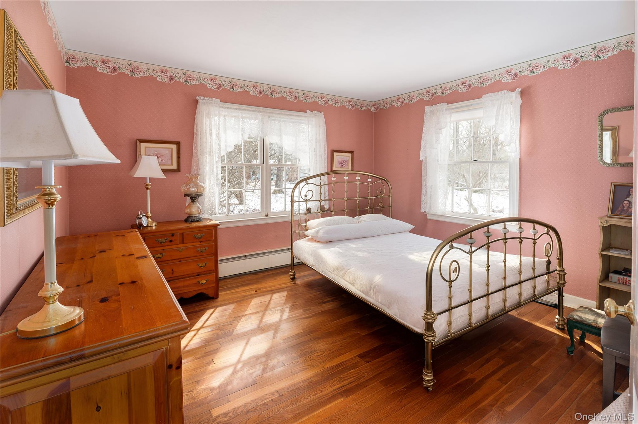 50 W Road South Salem, NY 10590 - Photo 15 of 29 a bedroom with a bed and wooden floor