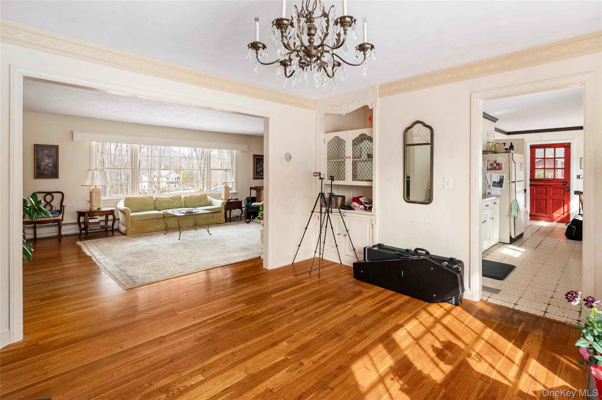 50 W Road South Salem, NY 10590 - Photo 8 of 29 a bedroom with a bed and a chandelier