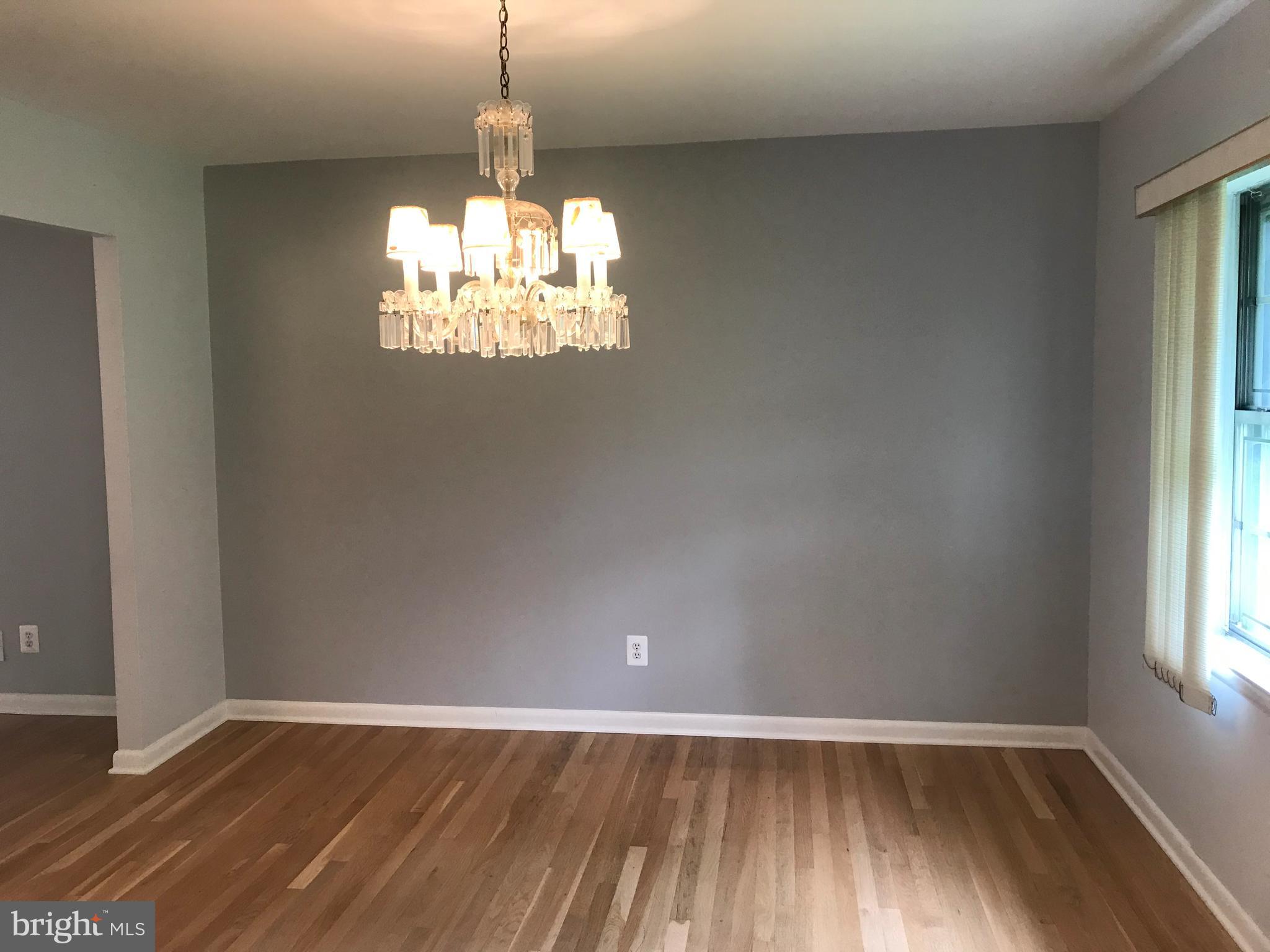 810 Smoke Tree Road Baltimore, MD 21208 - Photo 4 of 25 Dining Room with gorgeous hardwood floors