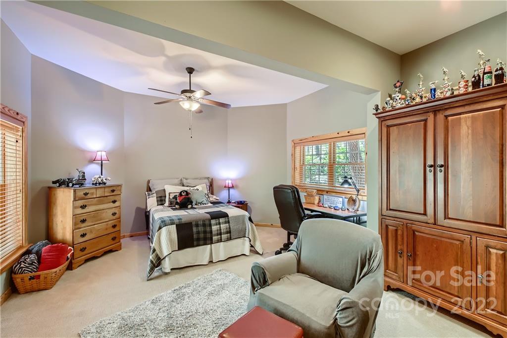 8754 Riverwood Road Terrell, NC 28682 - Photo 23 of 48 a living room with furniture ceiling fan and a window
