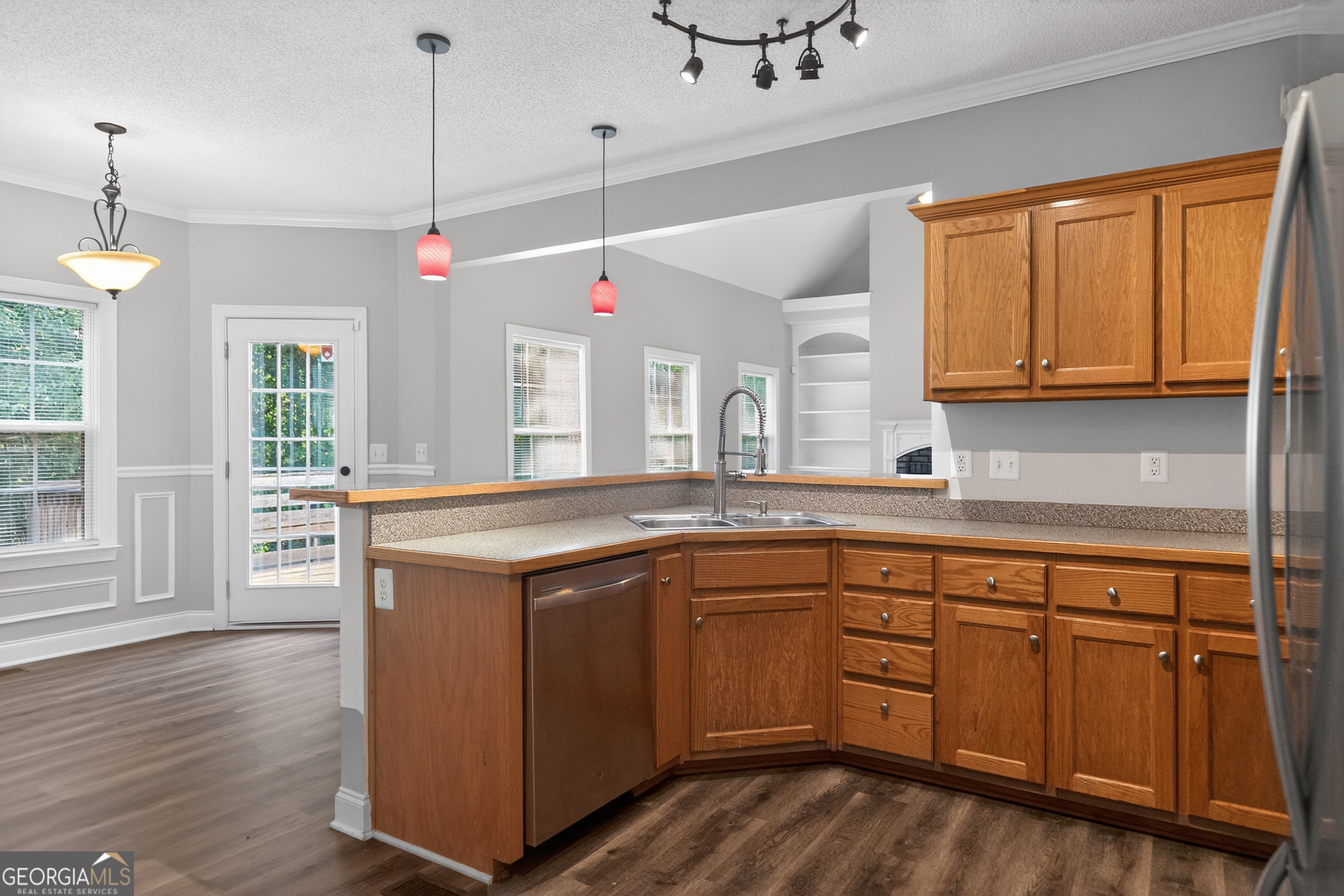 178 Rachel Boulevard Temple, GA 30179 - Photo 19 of 30 a kitchen with granite countertop appliances cabinets and a wooden floor