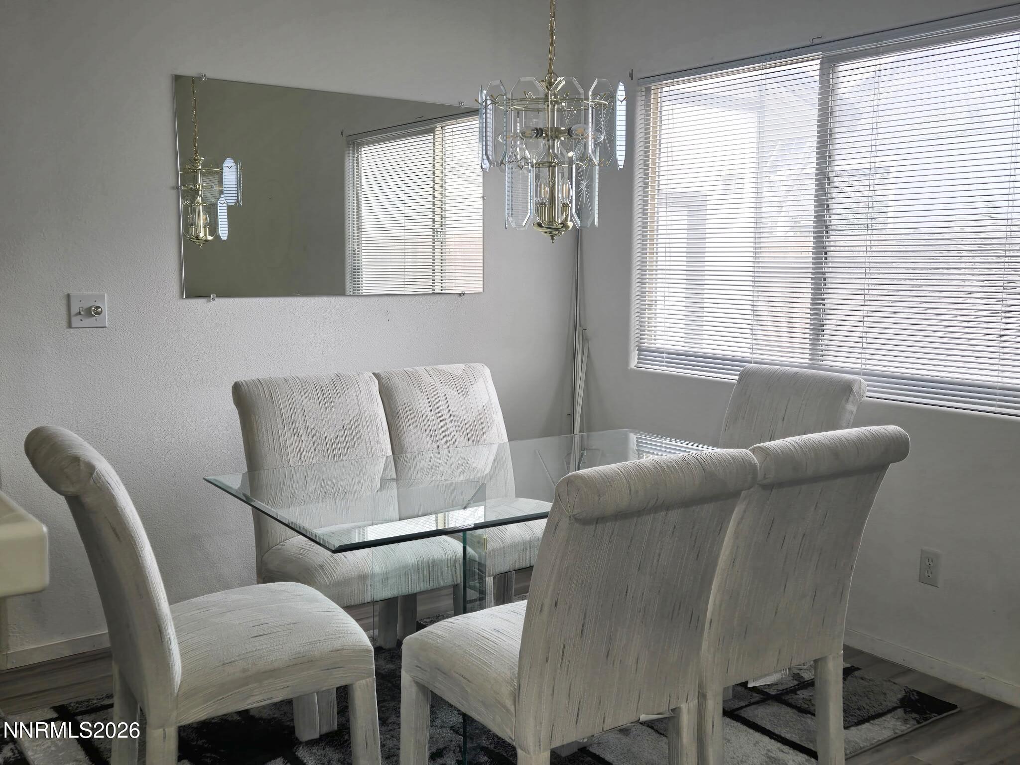 476 Jennys Lane Fernley, NV 89408 - Photo 13 of 29 a living room with furniture and a chandelier