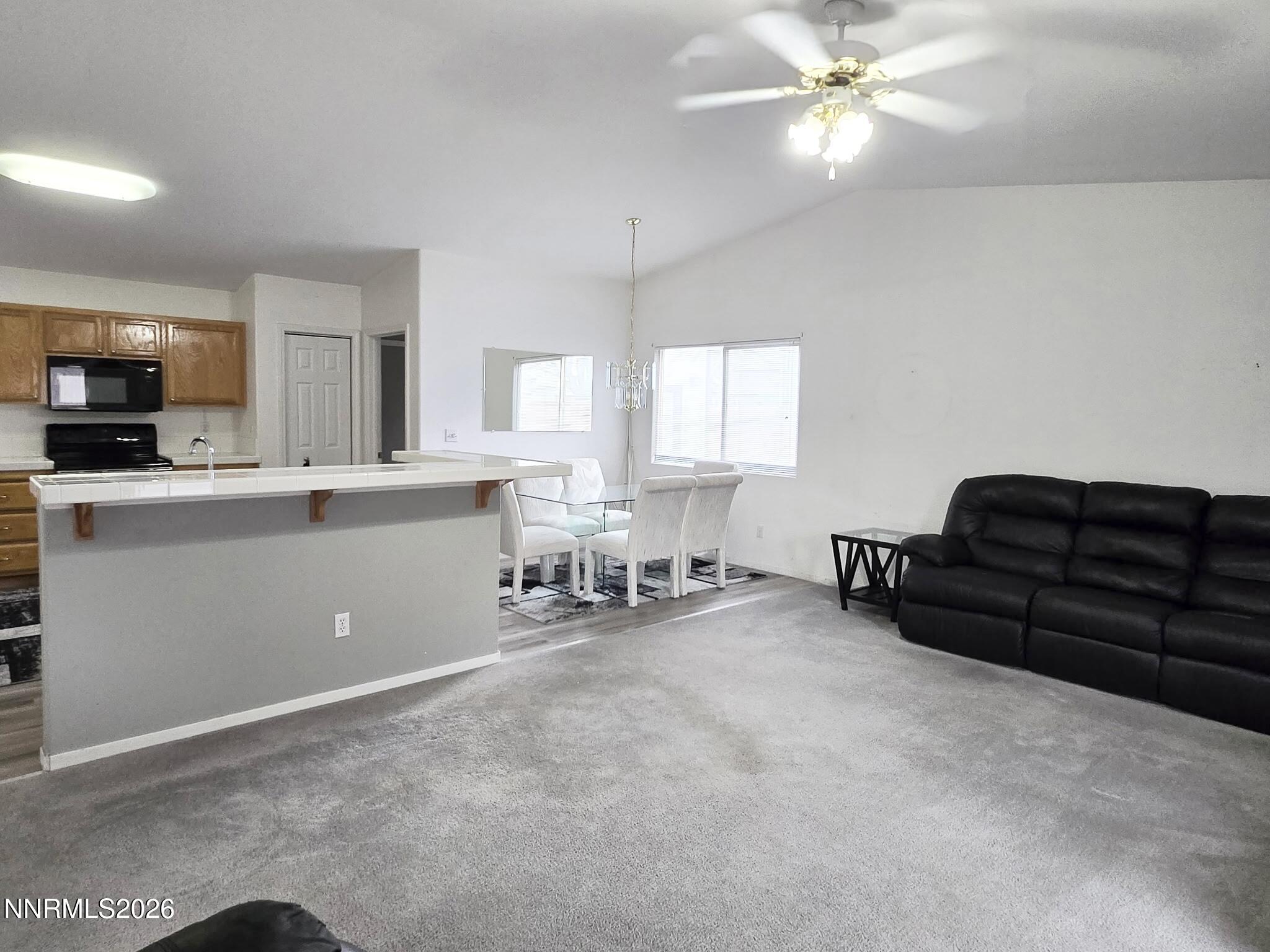 476 Jennys Lane Fernley, NV 89408 - Photo 4 of 29 a living room with furniture and a window