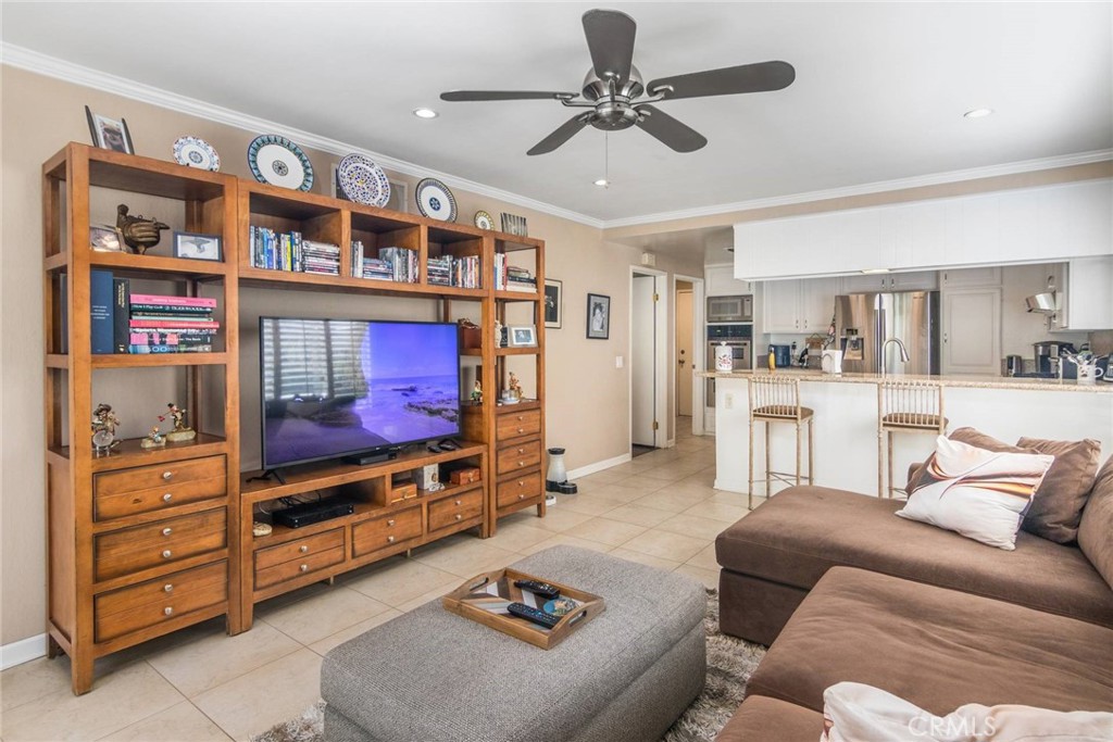 19343 Pauma Valley Drive Porter Ranch, CA 91326 - Photo 12 of 28 a living room with furniture and cabinets
