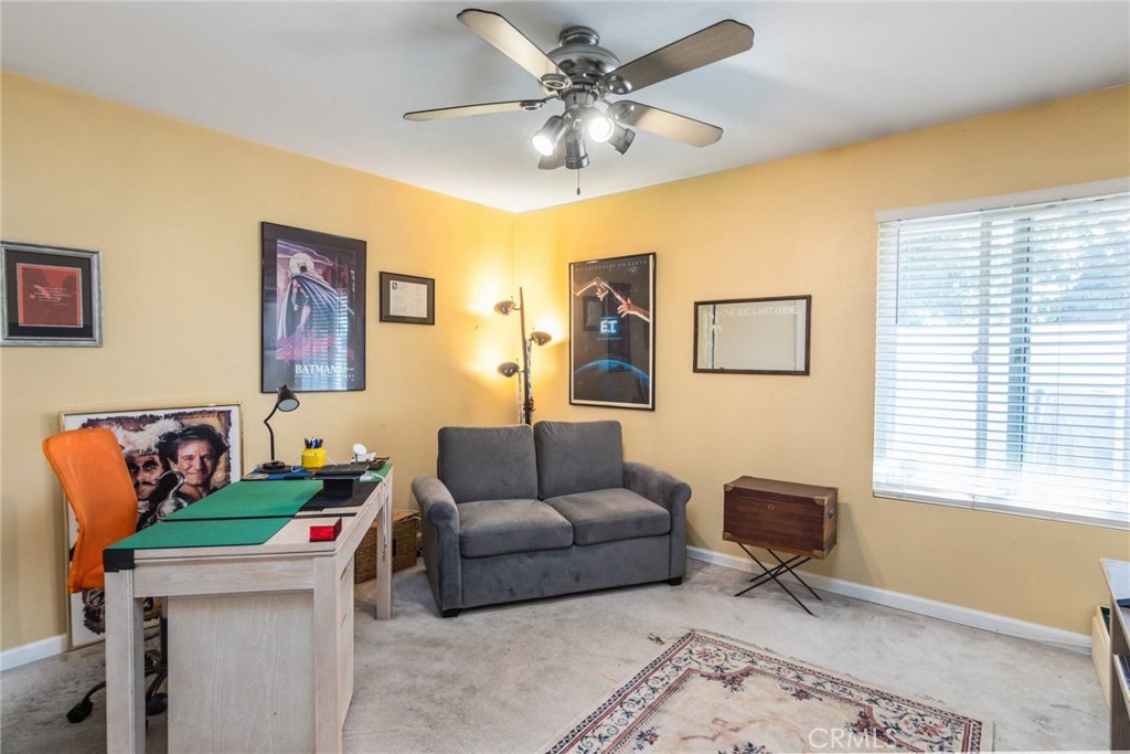19343 Pauma Valley Drive Porter Ranch, CA 91326 - Photo 18 of 28 a living room with furniture and a window
