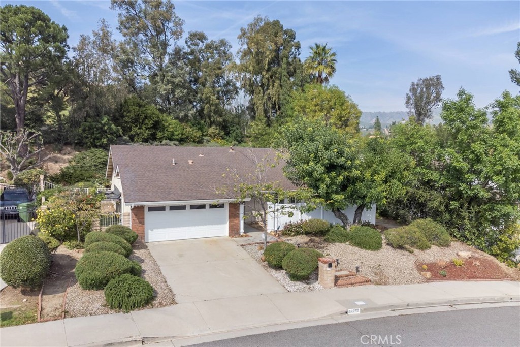 19343 Pauma Valley Drive Porter Ranch, CA 91326 - Photo 2 of 28 front view of a house with a yard