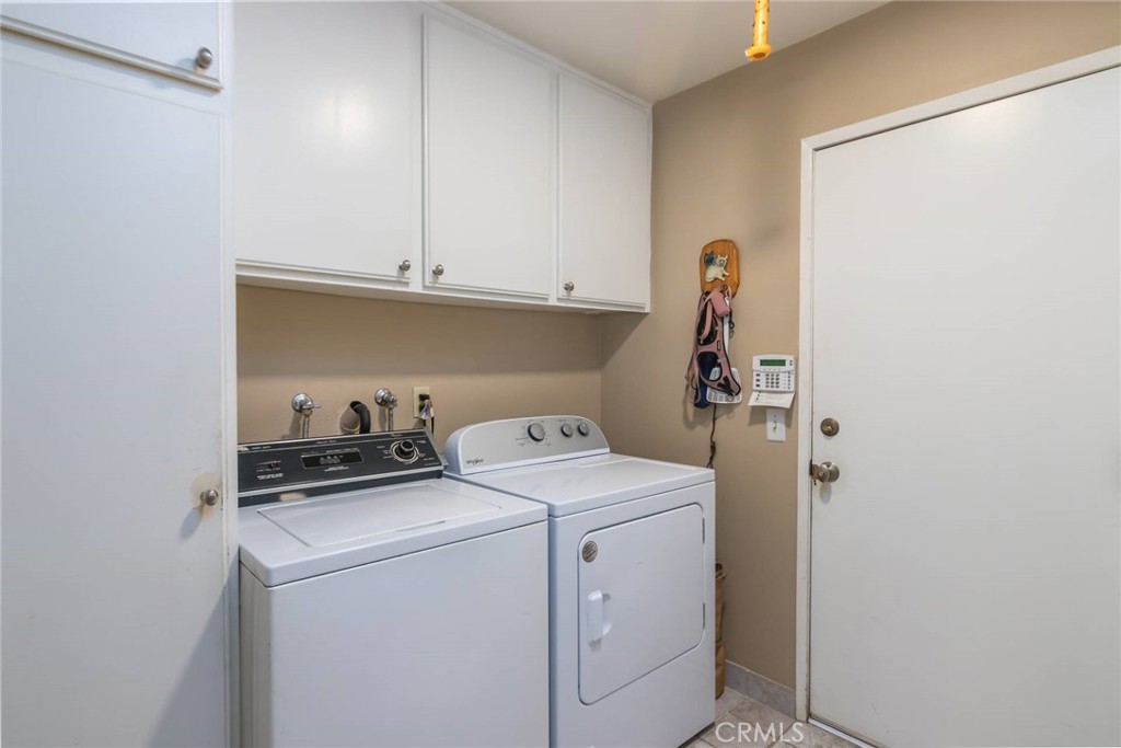 19343 Pauma Valley Drive Porter Ranch, CA 91326 - Photo 21 of 28 a utility room with dryer and washer