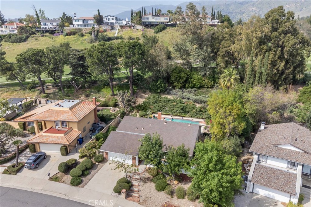19343 Pauma Valley Drive Porter Ranch, CA 91326 - Photo 26 of 28 an aerial view of multiple houses with yard