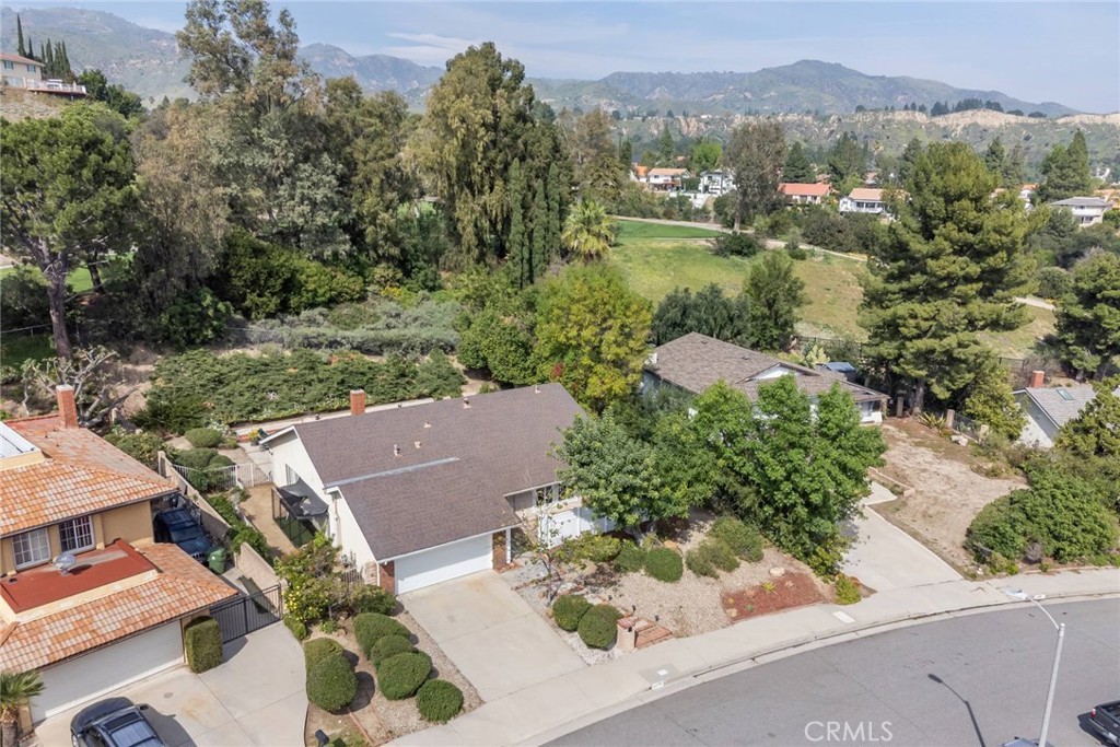 19343 Pauma Valley Drive Porter Ranch, CA 91326 - Photo 27 of 28 an aerial view of a house with outdoor space and street view
