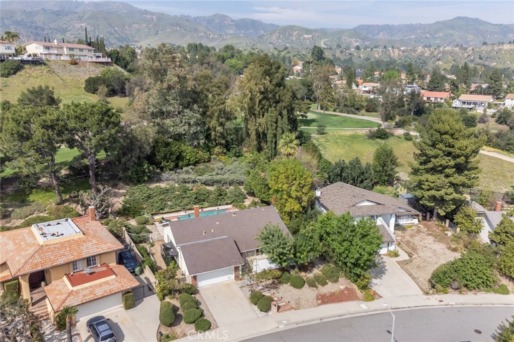 19343 Pauma Valley Drive Porter Ranch, CA 91326 - Photo 28 of 28 an aerial view of residential house with outdoor space and lake view