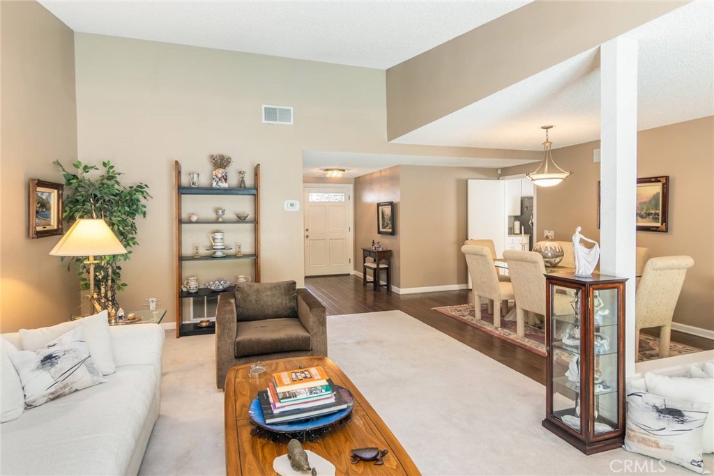19343 Pauma Valley Drive Porter Ranch, CA 91326 - Photo 4 of 28 a living room with furniture and wooden floor