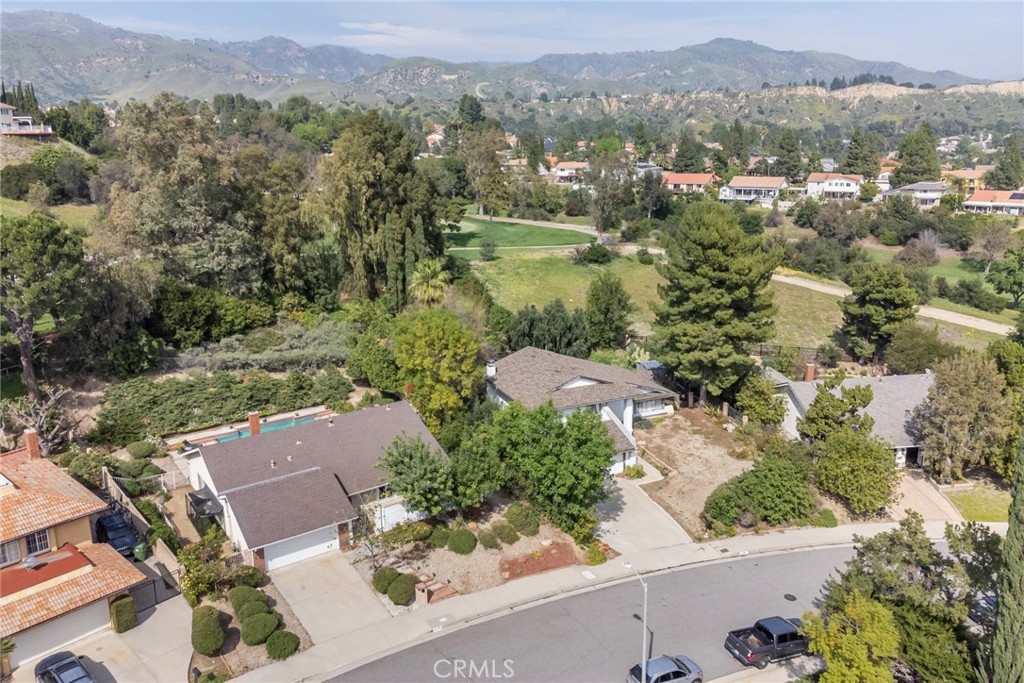 19343 Pauma Valley Drive Porter Ranch, CA 91326 - Photo 10 of 28 an aerial view of a city with lots of residential buildings
