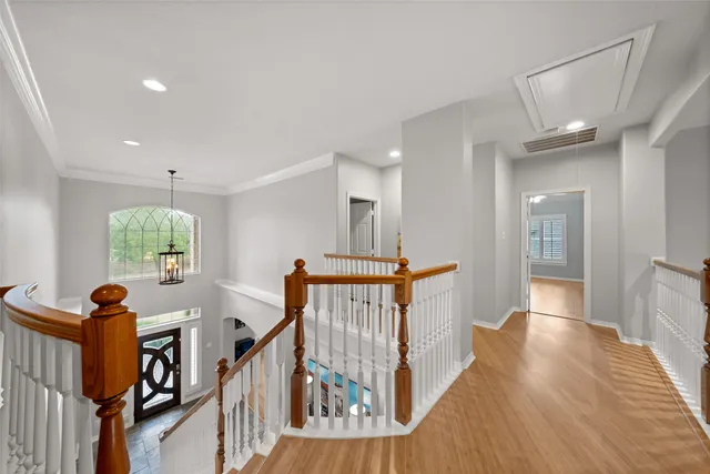 a view of entryway with wooden floor