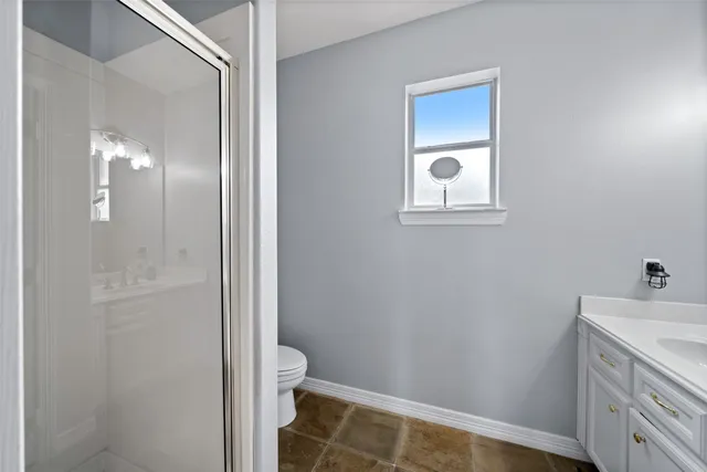 a bathroom with a sink and a vanity