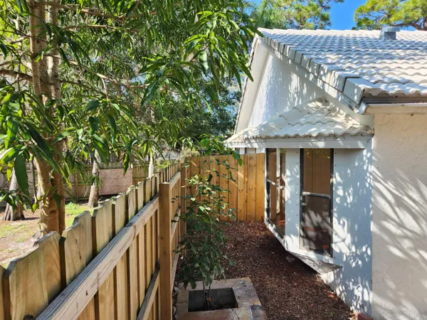 a view of a street with sitting area