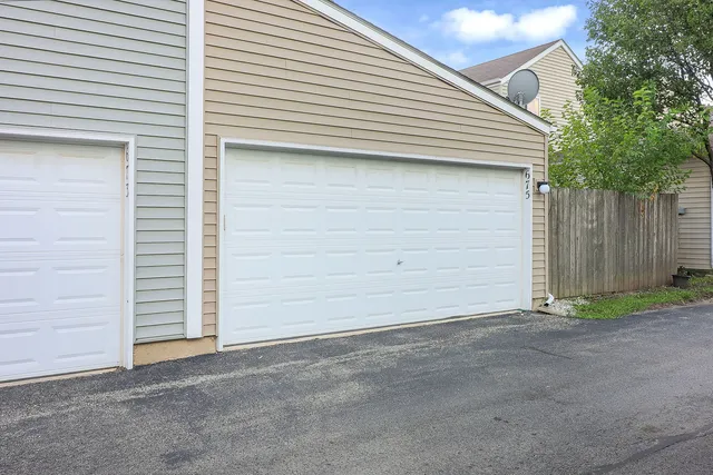 a view of a lake with a yard