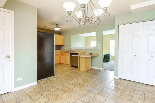 a view of a kitchen with a sink