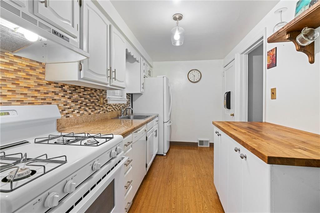 435 Filmore Road Pittsburgh, PA 15221 - Photo 14 of 37 Beautiful and bright kitchen.
