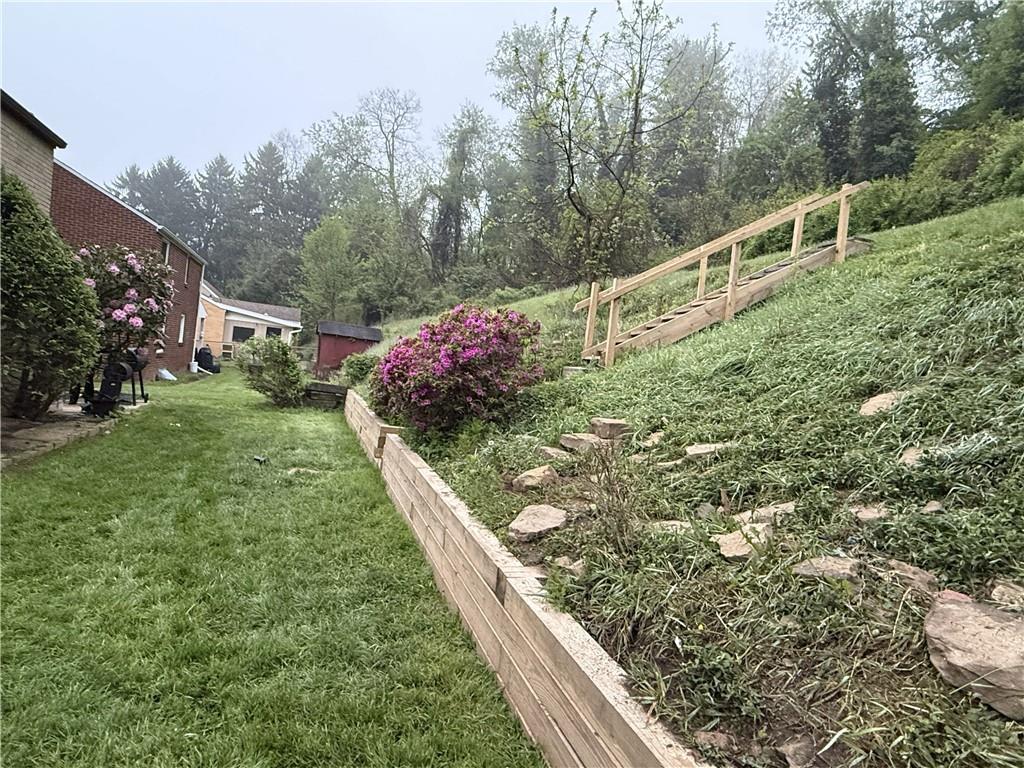 435 Filmore Road Pittsburgh, PA 15221 - Photo 5 of 37 New retaining wall and staircase to the upper yard.