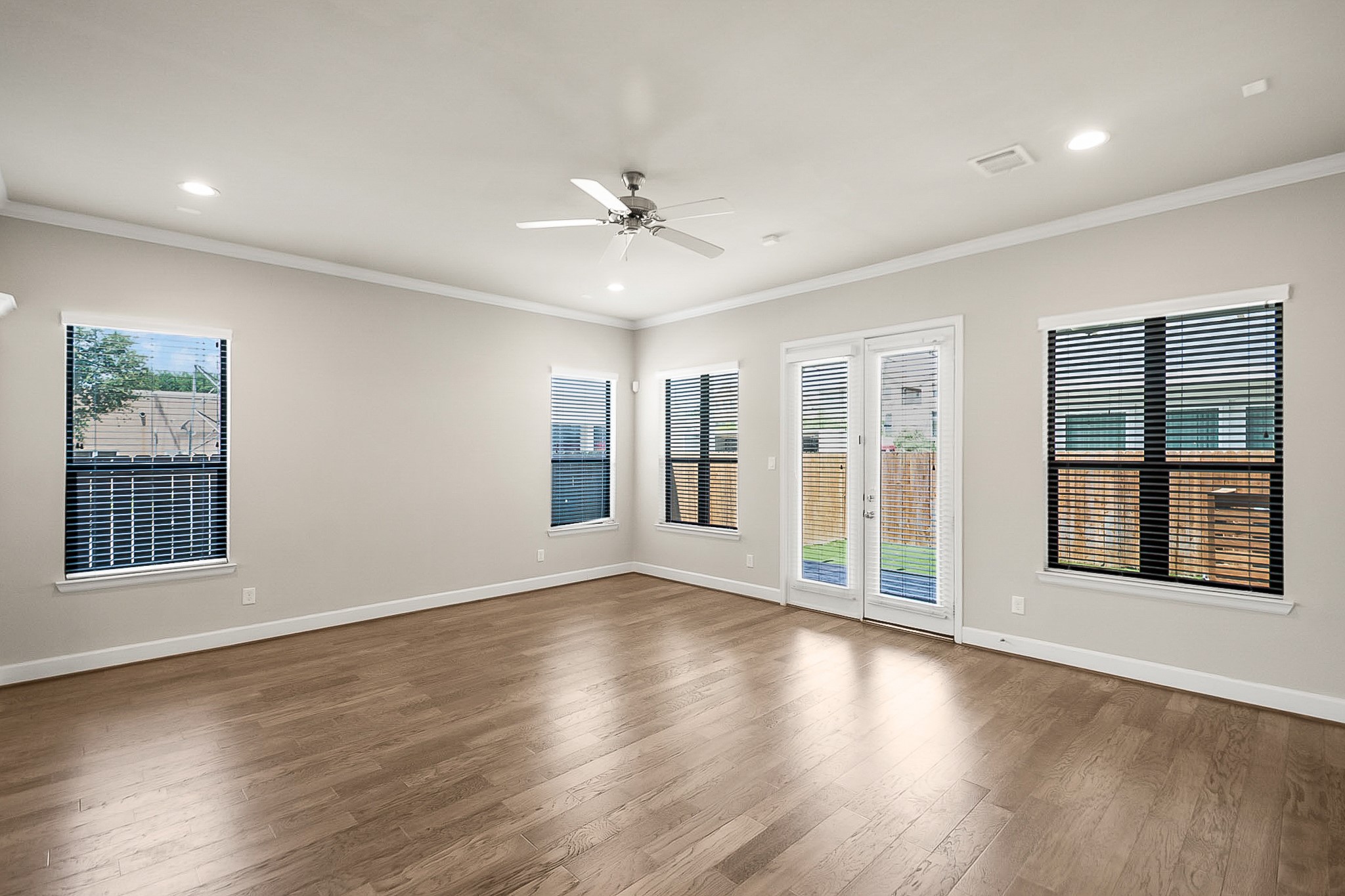 5328 Larkin Street Houston, TX 77007 - Photo 5 of 27 Spacious living area designed for both comfort and entertaining, seamlessly connecting to the kitchen/dining spaces and backyard.