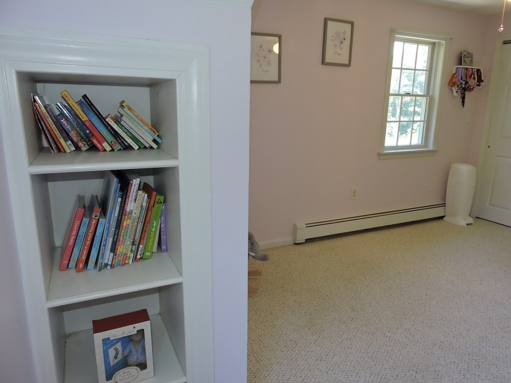 120 North Sturbridge Road Charlton, MA 01507 - Photo 17 of 39 a view of walk in closet with clothes and shoes