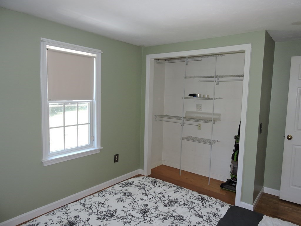 120 North Sturbridge Road Charlton, MA 01507 - Photo 19 of 39 a view of room with window and wooden floor