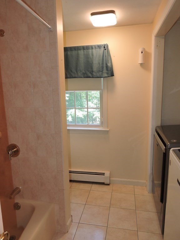 120 North Sturbridge Road Charlton, MA 01507 - Photo 28 of 39 a bathroom with a bathtub and shower