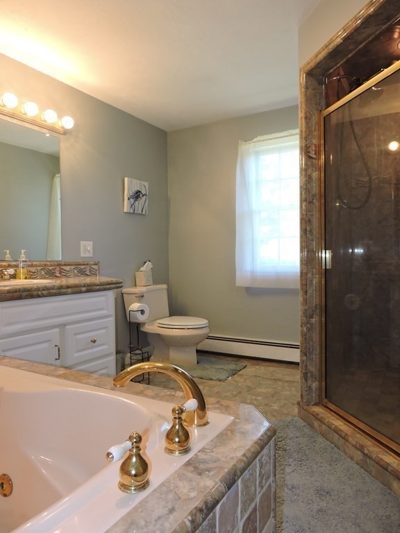 120 North Sturbridge Road Charlton, MA 01507 - Photo 32 of 39 a dining room with a table and chairs
